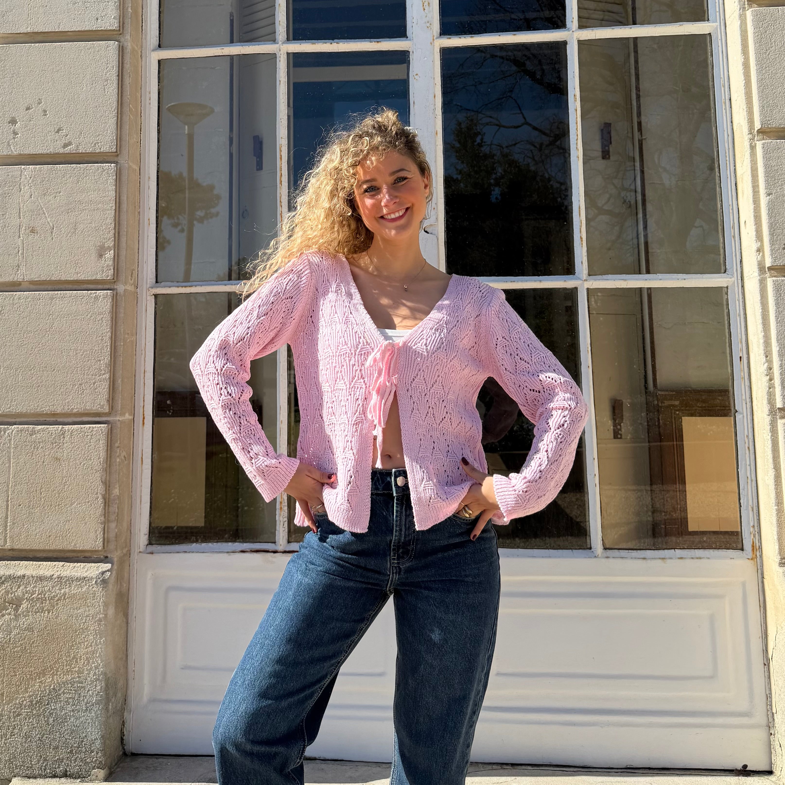 Gilet manches longues GRACE en maille ajouré rose.