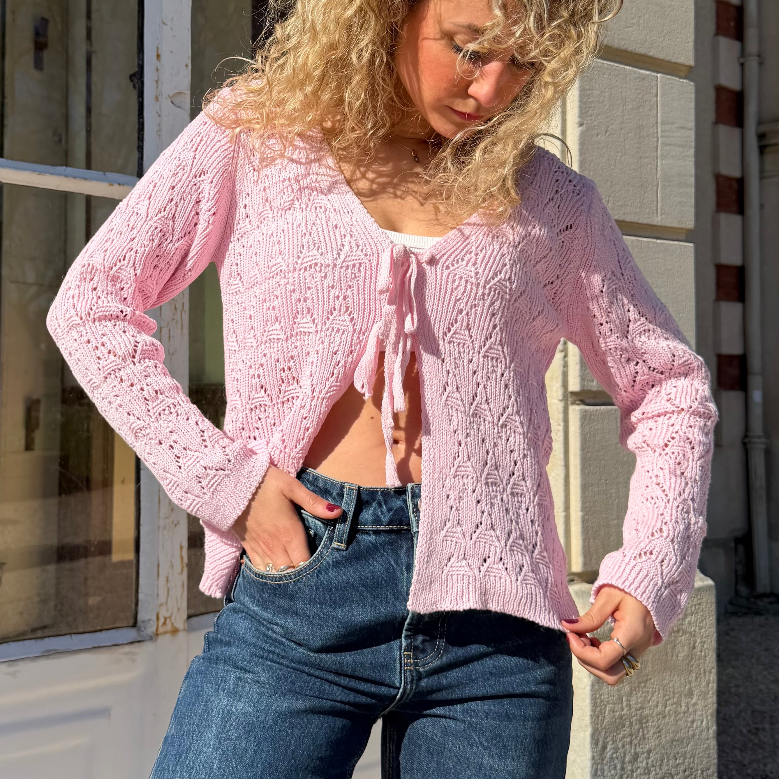 Gilet manches longues GRACE en maille ajouré rose.