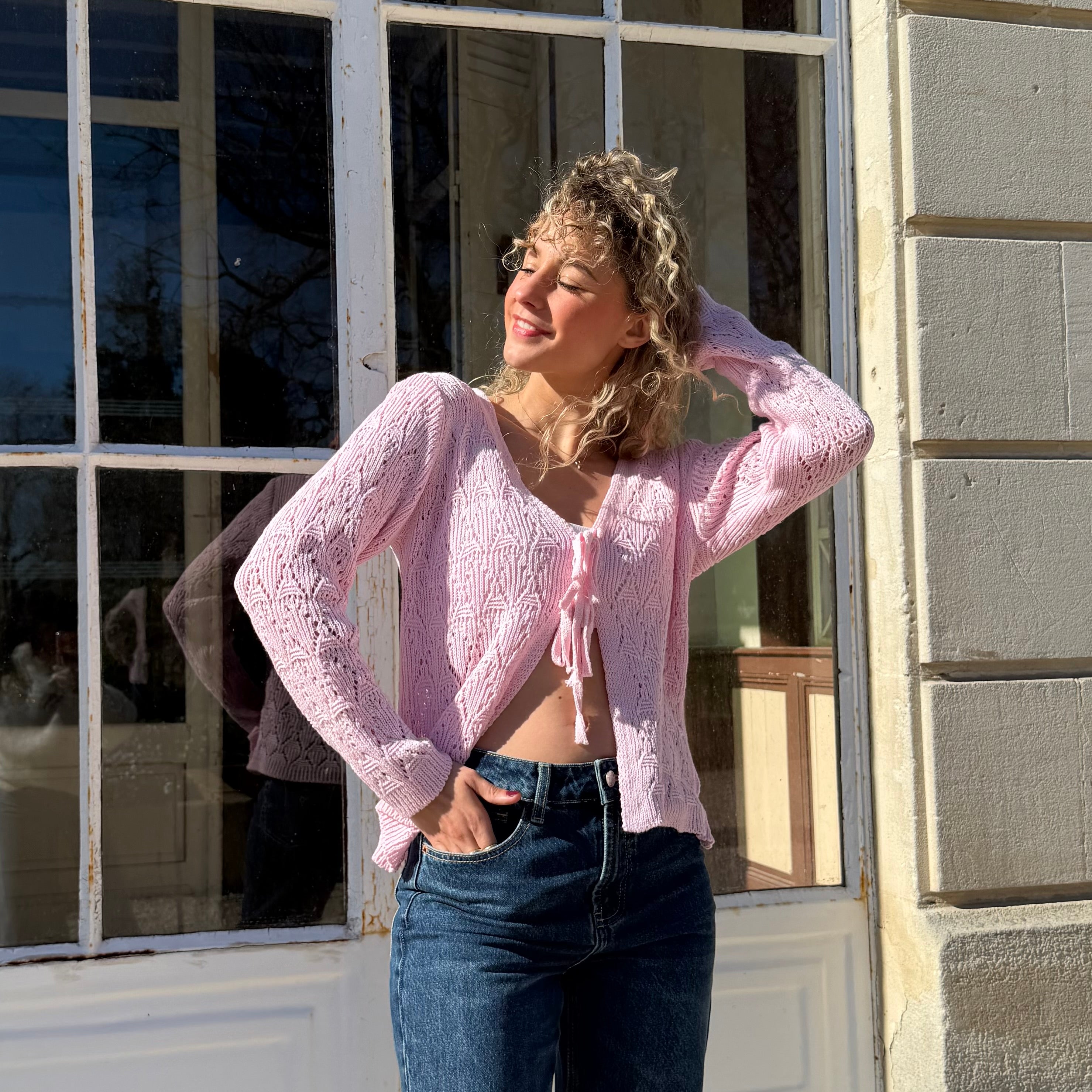 Gilet manches longues GRACE en maille ajouré rose.