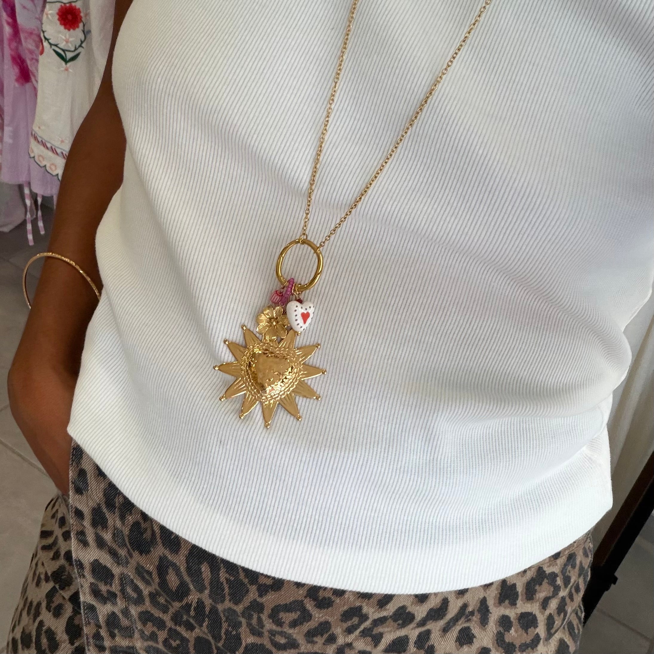 Collier sautoir doré pendentifs cœur soleil