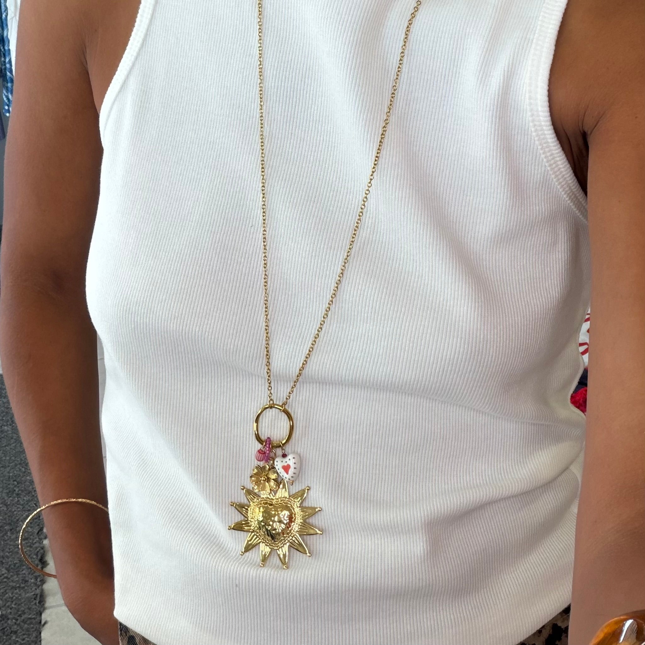 Collier sautoir doré pendentifs cœur soleil